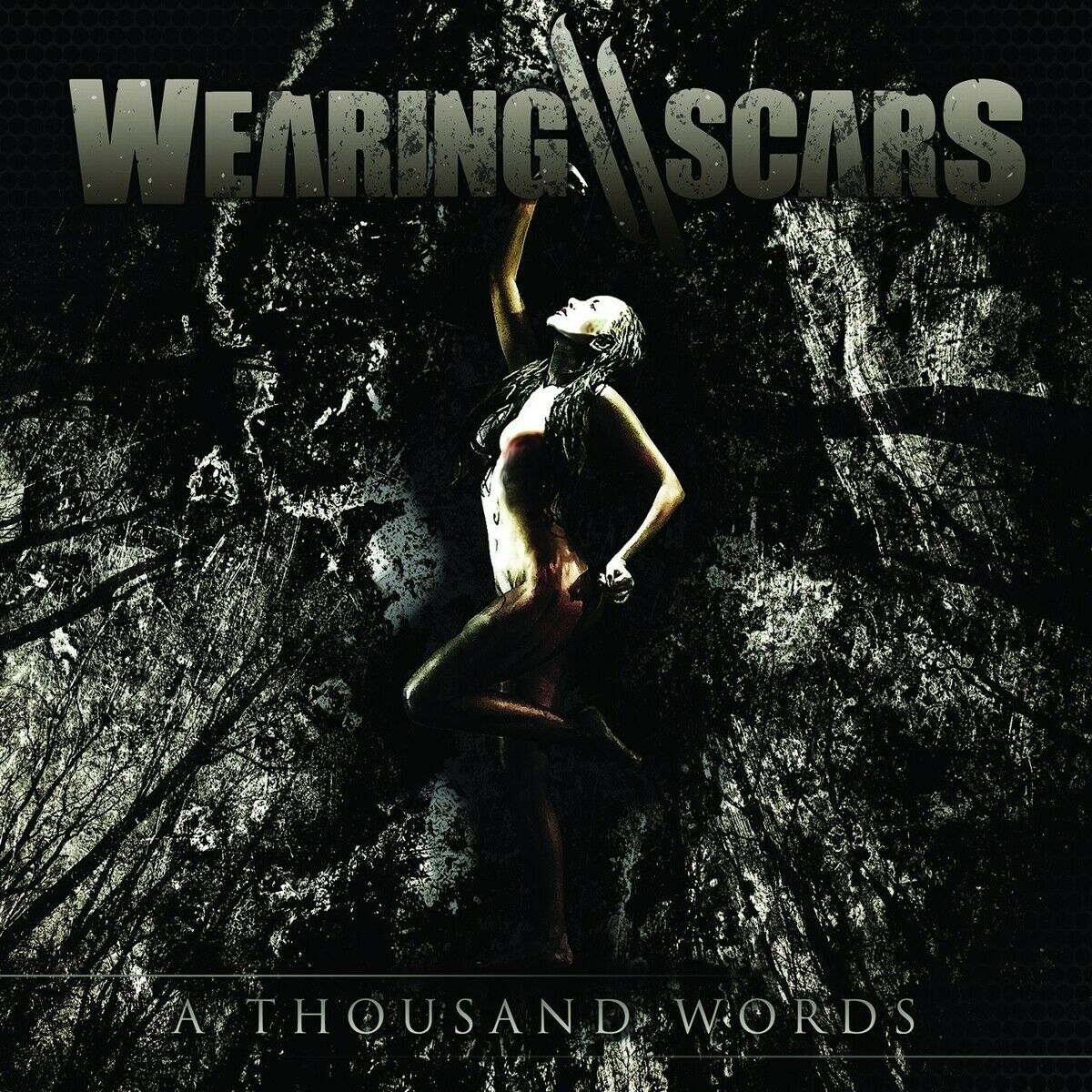 Wearing Scars - A Thousand Words in the group CD / CD Hardrock at Bengans Skivbutik AB (1387214)