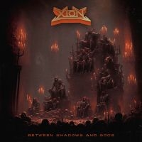 Xion - Between Shadows And Gods (Red vinyl) i gruppen VI TIPSAR / Fredagsreleaser / Fredag den 19e Jan 24 hos Bengans Skivbutik AB (5508435)