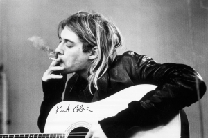 Kurt Cobain - Smoking Acoustic Guitar 91,5 X 61 Cm in the group OTHER / Merchandise at Bengans Skivbutik AB (5634282)